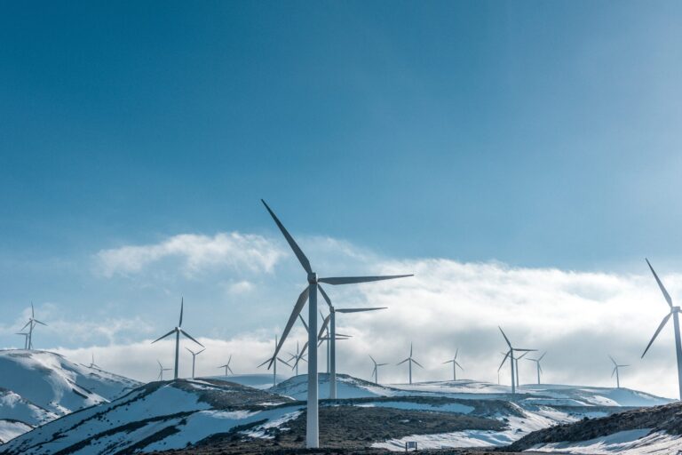Windturbines with clouds in background